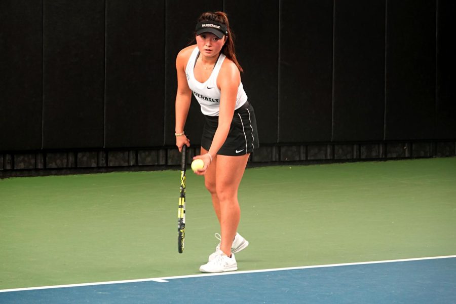 Vanderbilt womens tennis player prepares to serve, as photographed on Feb. 17, 2023. (Hustler Multimedia/Narenkumar Thirmiya)