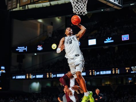 Tyrin Lawrence throws down a dunk against Mississippi State, as photographed on March 4th, 2023 (Hustler Multimedia/Ophelia Lu).