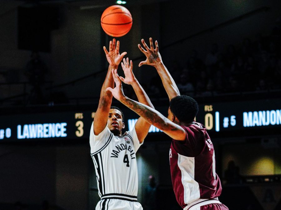 Jordan Wright shoots a 3-pointer against Mississippi State on March 4 (Hustler Multimedia/Ophelia Lu).