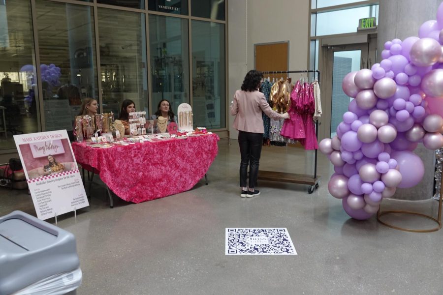 Visitors to the Renaissance Women’s Summit browse through vendor booths, as photographed on Feb. 26, 2023. (Hustler Multimedia/Keng Teghen)