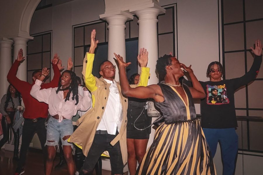 Led by founder Qwynn Foster, Vandy Vanity models dance and rejoice in celebration of completing their fashion show, Our Heavenly Bodies. (Hustler Multimedia/Nikita Rohila)