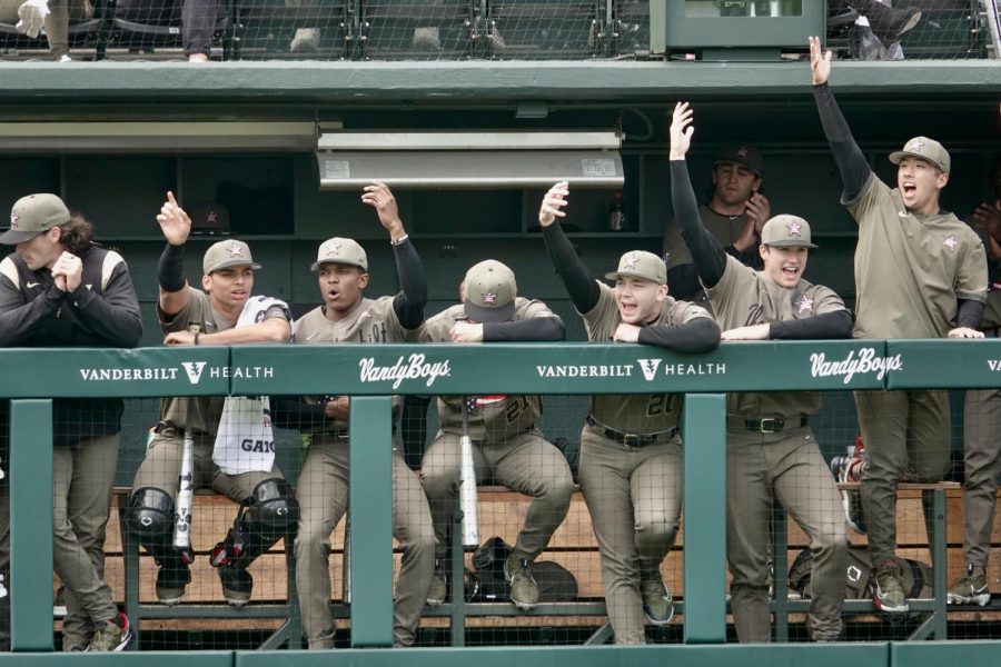 The Vanderbilt dugout celebrates as a run scores, as photographed on April 16, 2023 (Hustler Multimedia/Lindsey Jorda).