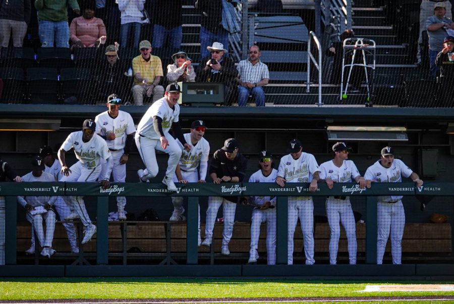 The Vanderbilt team jumps out of the dugout to celebrate a run, as photographed on April 1, 2023. (Hustler Multimedia/Michael Tung)