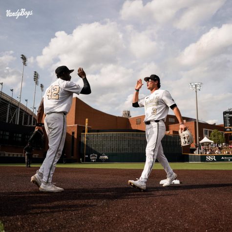 RJ Schreck and RJ Austin high-fiving on April 15, 2023 (Vanderbilt Athletics).