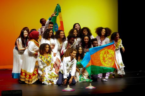 The Ethiopian/Eritrean dancers with their flags, at the Harambee Cultural Showcase, as captured on April 8, 2022 (Hustler Multimedia/Sean Onamade)