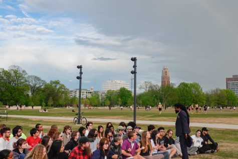 A rainbow appears as Reverend Osagyefo Sekou leads a non-violent direct action training for students in the Tennessee Student Solidarity Network at Centennial Park, as photographed on April 13, 2023. (Hustler Staff/Katherine Oung)