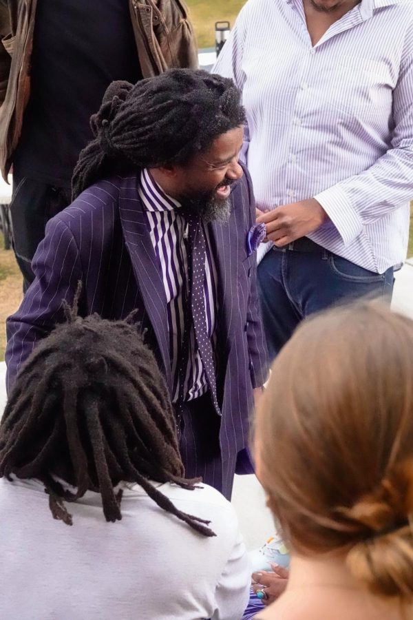 Reverend Osagyefo Sekou converses with students in the Tennessee Student Solidarity Network at a nonviolent direct action training in Centennial Park, as photographed on April 13, 2023. (Hustler Staff/Katherine Oung)