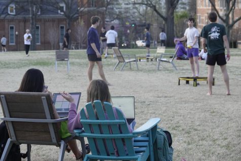 Students study and relax on Alumni Lawn, as photographed on March 11, 2023. (Hustler Multimedia/Katherine Oung) 