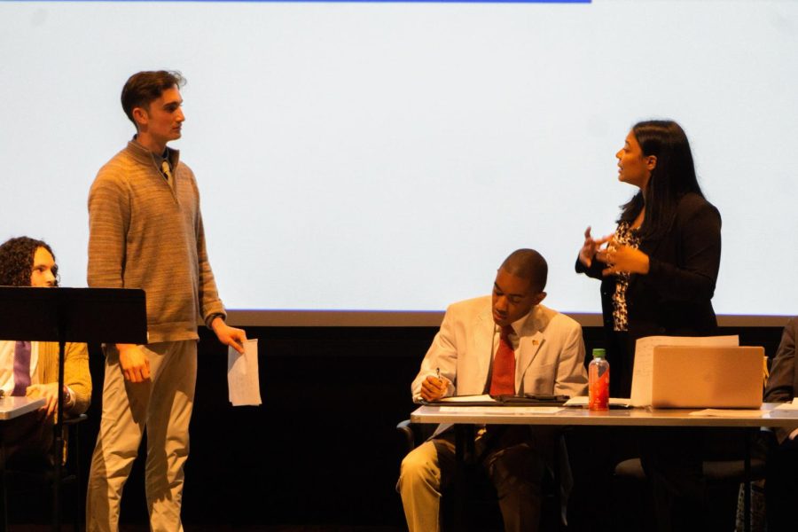 First-year Mya Doyle questions senior Tucker Apgar during the first cross-examination of the debate, captured on April 4, 2023. (Hustler Multimedia/Laura Vaughan)