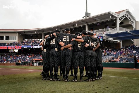 The VandyBoys huddling before their game on May 12, 2023 (Vanderbilt Athletics).