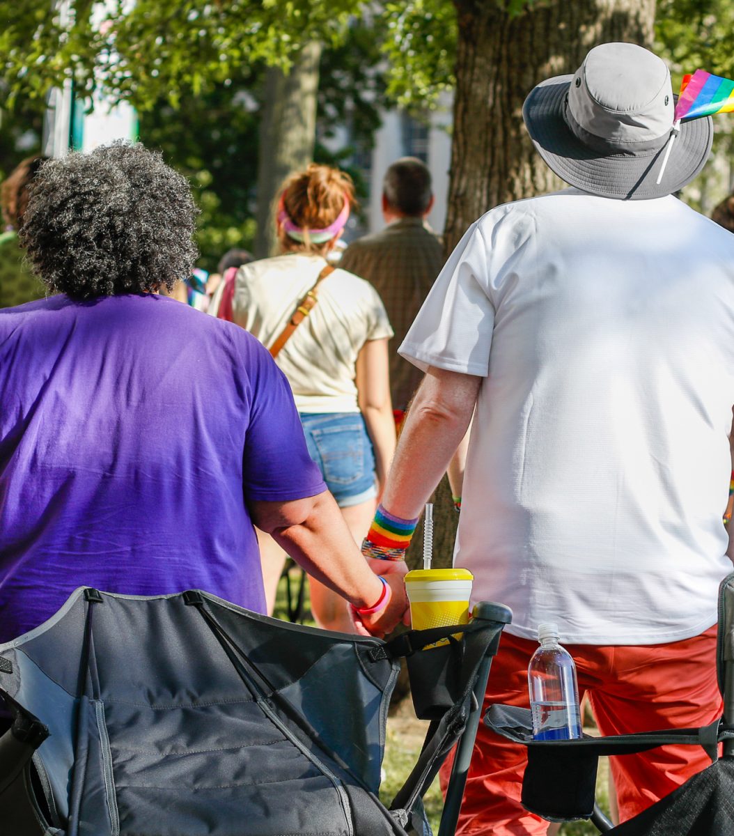 A couple holds hands while watching the mainstage, as photographed on June 25, 2023. (Hustler Multimedia/Barrie Barto) 