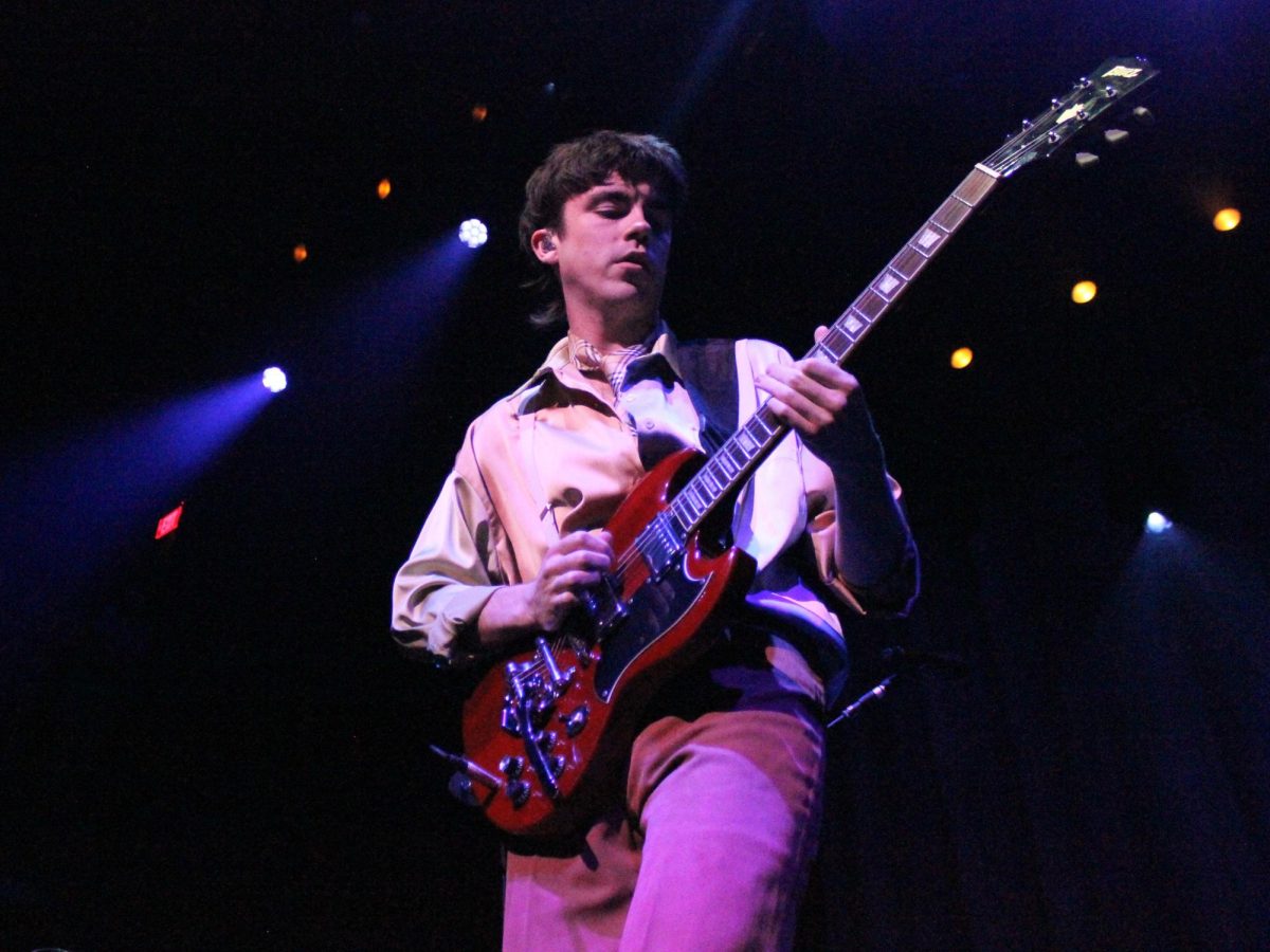 Declan McKenna heads to the front of the stage for a guitar solo, as photographed on July 30, 2023. (Hustler Multimedia/Olivia Noell)