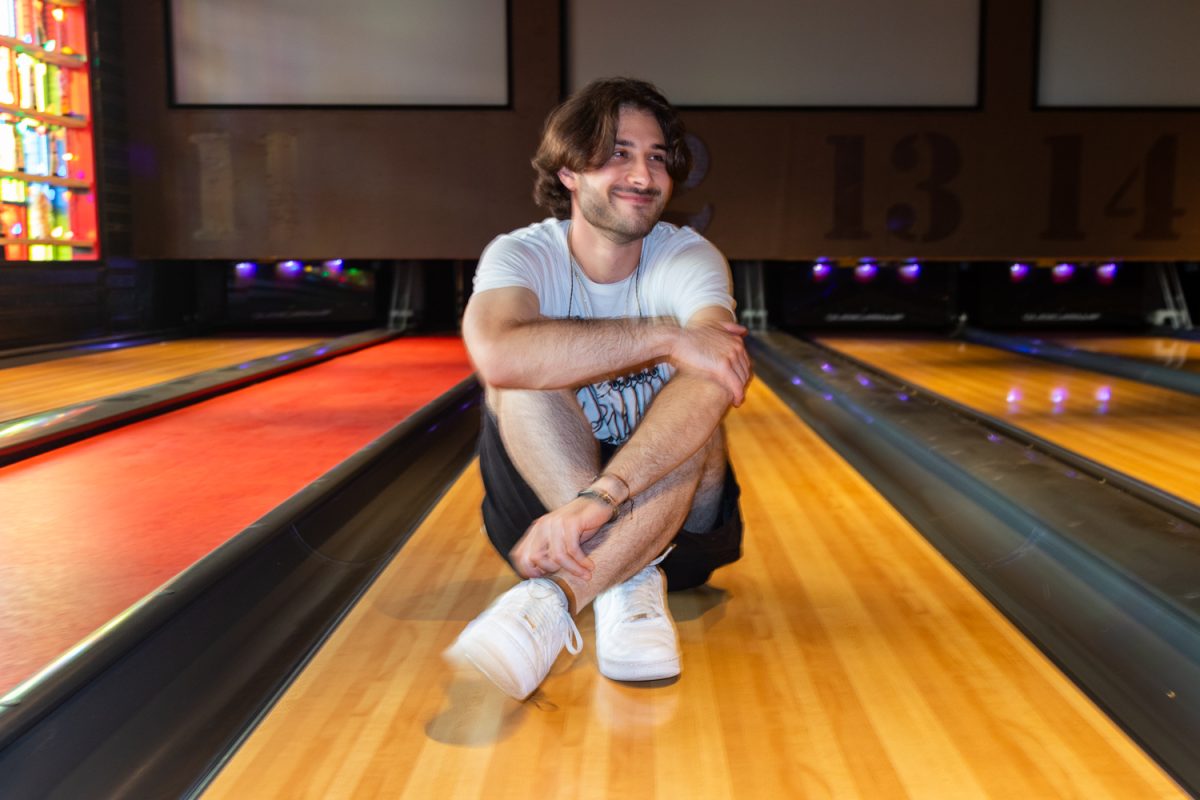HARIZ sits on the bowling alley at Brooklyn Bowl, as photographed on Aug 23. 2023. (Hustler Multimedia/Barrie Barto)
