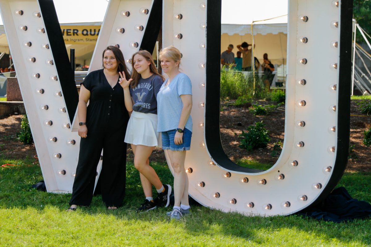 A first-year smiles on the Commons for a picture, as photographed on Aug. 19, 2023. (Hustler Multimedia/Barrie Barto)
