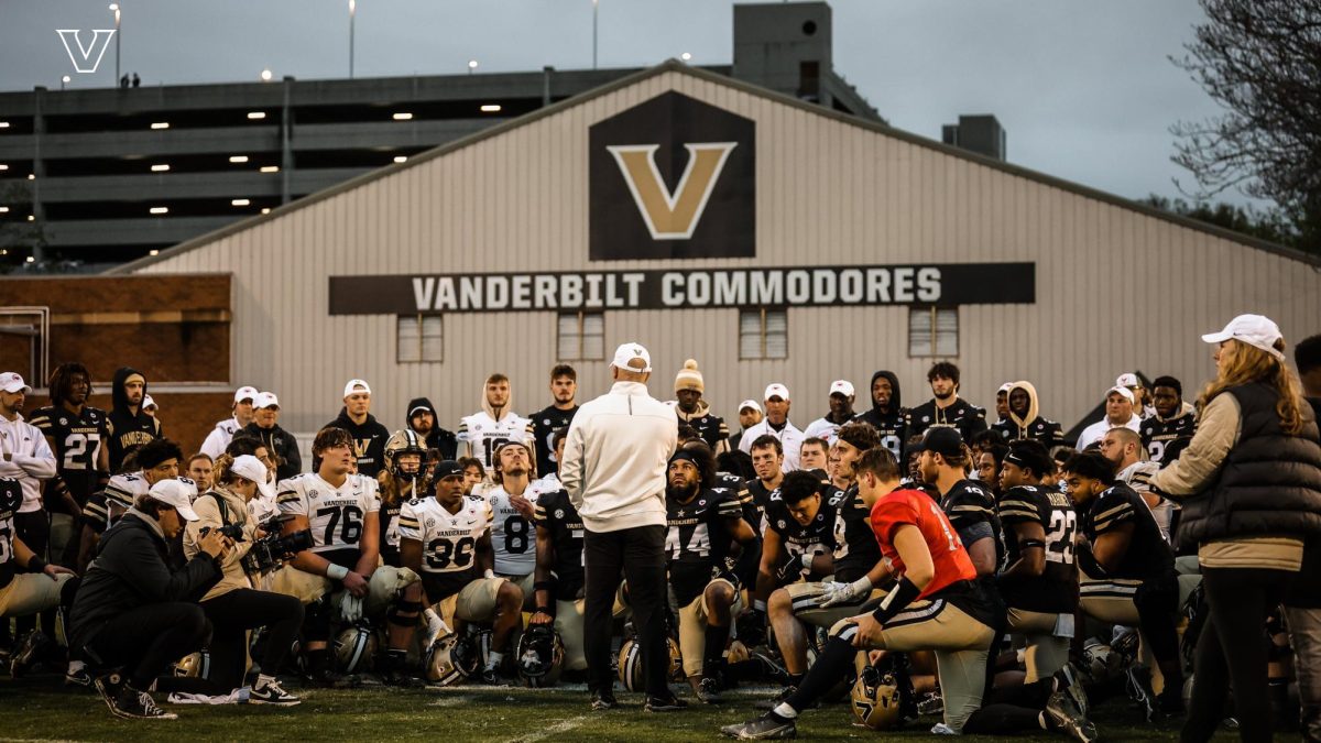 Vanderbilt Football gathers around head coach Clark Lea after practice.