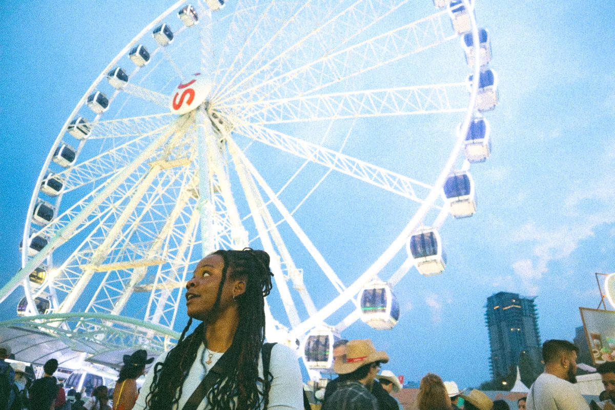 Precious in front of the Ferris Wheel at the Calgary Stampede, as photographed on July 15, 2023. (Hustler Multimedia/Sean Onamade)