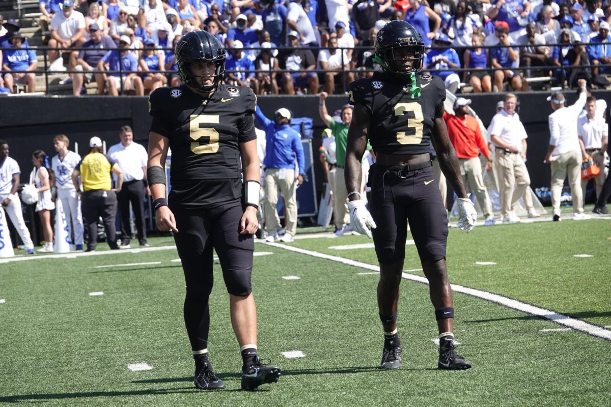 AJ Swann and Quincy Skinner Jr. standing next to each other on the field, as photographed on Sept. 23, 2023. (Hustler Multimedia/Chloe Pryor)