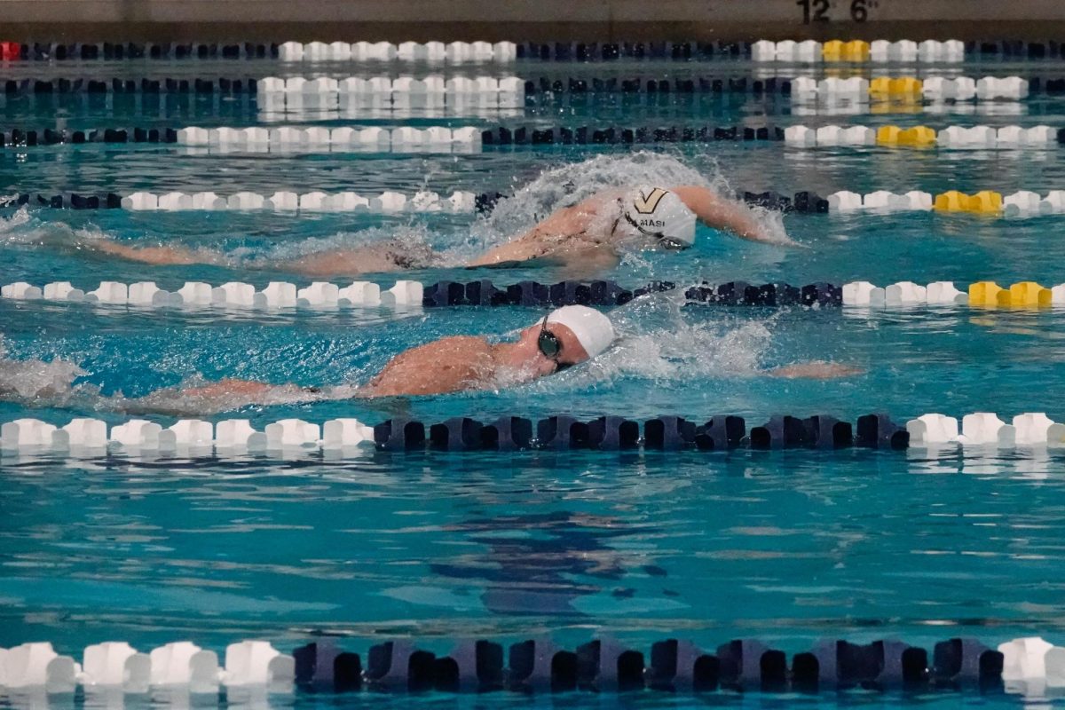 Jenna Ravarino and Gray Almasi competing in Heat 2 of the 100-yard Freestyle as photographed on September 29, 2023. (Hustler Multimedia/Olivia Noell)