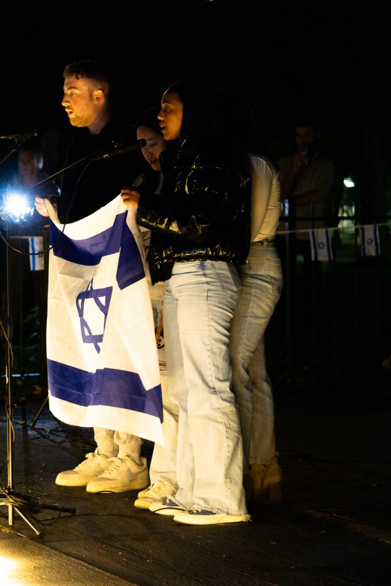 Israelis and students sing the Israeli national anthem, as captured on Oct. 10, 2023. (Hustler Multimedia/Laura Vaughan)
