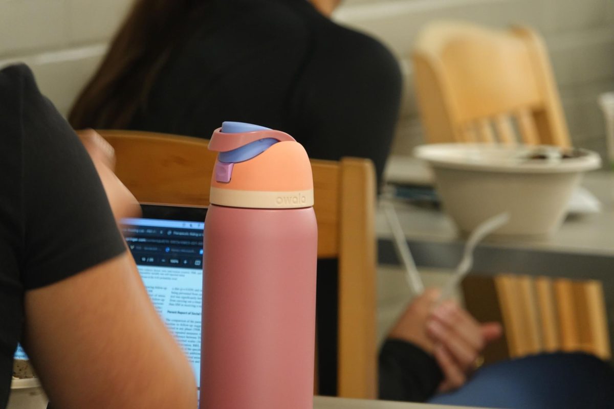 24-oz Pink Taupe Owala bottle supports hard-working student in Rand Dining Hall, as photographed on Sept. 29, 2023. (Hustler Multimedia/Abby Hoelscher)