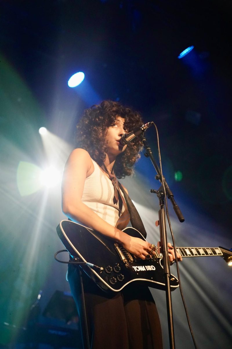 Towa Bird strums her guitar while performing, as captured on Oct. 16, 2023. (Hustler Multimedia/Sara West)
