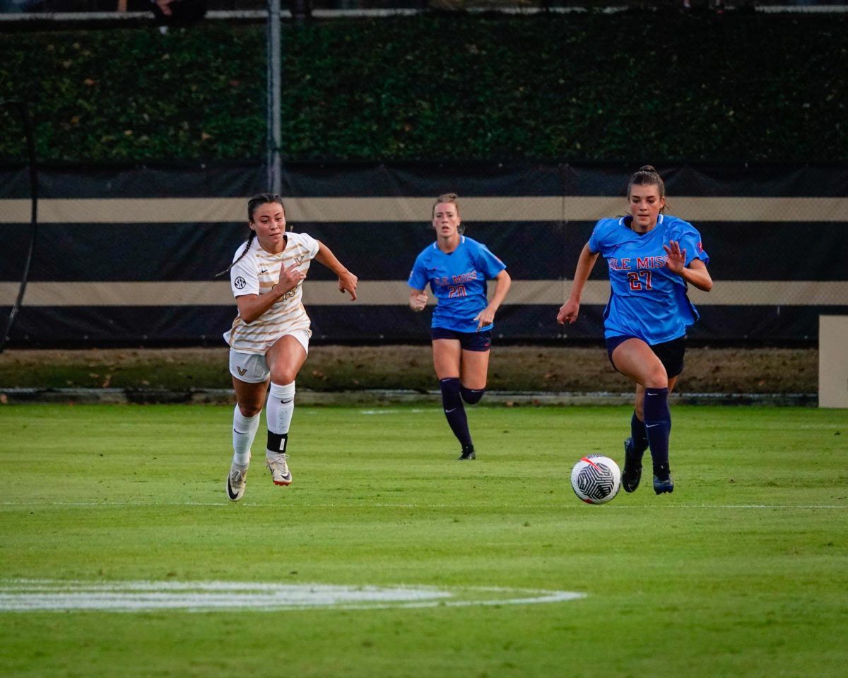 Maddie Baker running towards the ball as two Ole Miss players run after it, as photographed on Sept. 21, 2023. (Hustler Multimedia/Vince Lin)