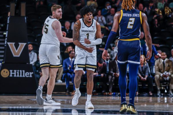 Colin Smith celebrates after making a 3-pointer during Vanderbilts game against UNC Greensboro, as photographed on Nov. 14, 2023. (Hustler Multimedia/Josh Rehders)
