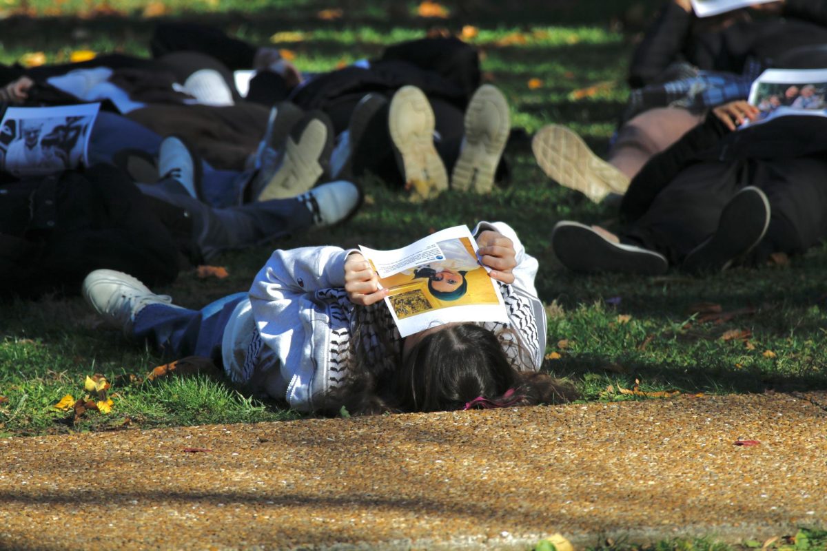 Students lay in die-in protest, as photographed on Dec. 7, 2023. (Hustler Multimedia/Barrie Barto)