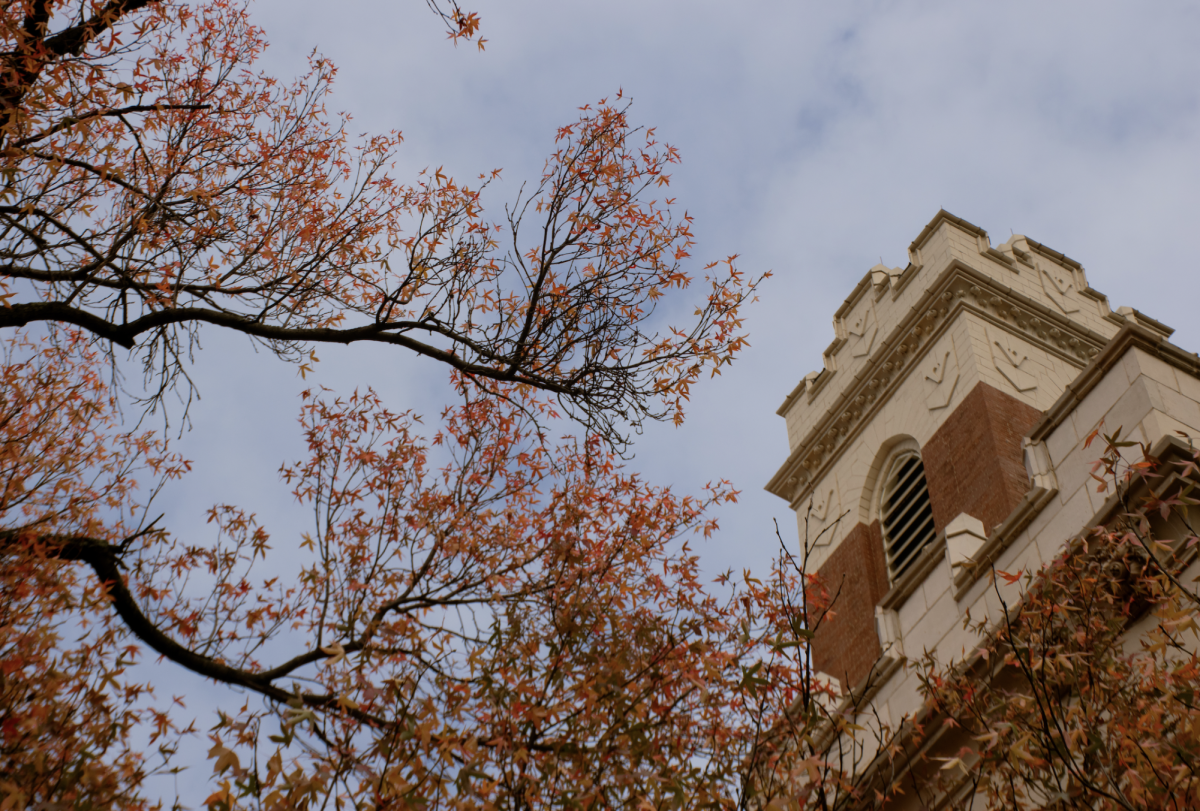 Orange fall leaves in front of Kirkland Hall, as photographed on Nov. 10, 2023. (Hustler Multimedia/Savannah Walske)
