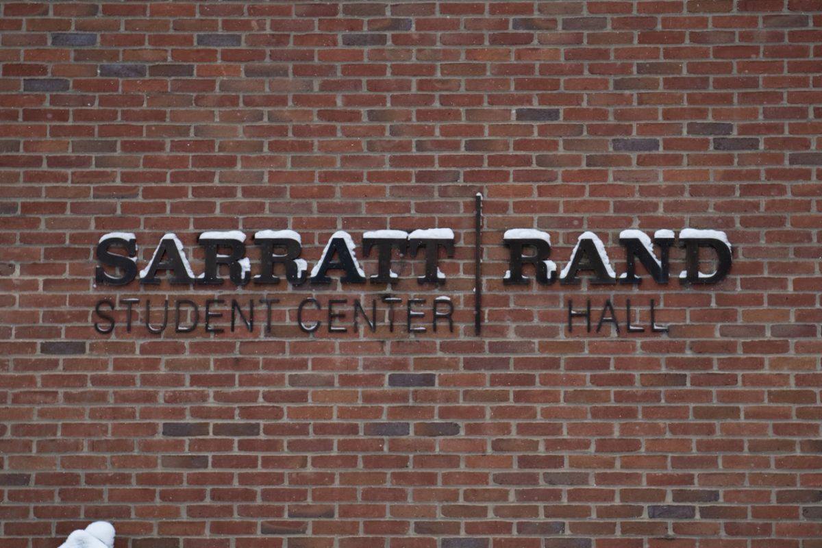 The sign outside Sarratt Student Center and Rand Hall covered in snow, as photographed on Jan. 15, 2024. (Hustler Multimedia/Savannah Walske)