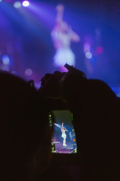 Lapid's videographer records her performance of "The Outsider," as captured at Exit/In on Feb. 8, 2024. (Hustler Multimedia/Arianna Santiago).