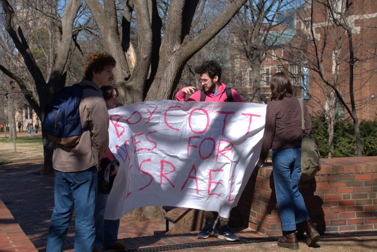  JVP on the Rand Patio holding a sign saying Boycott Dores for Israel, as photographed on Feb. 14, 2024.