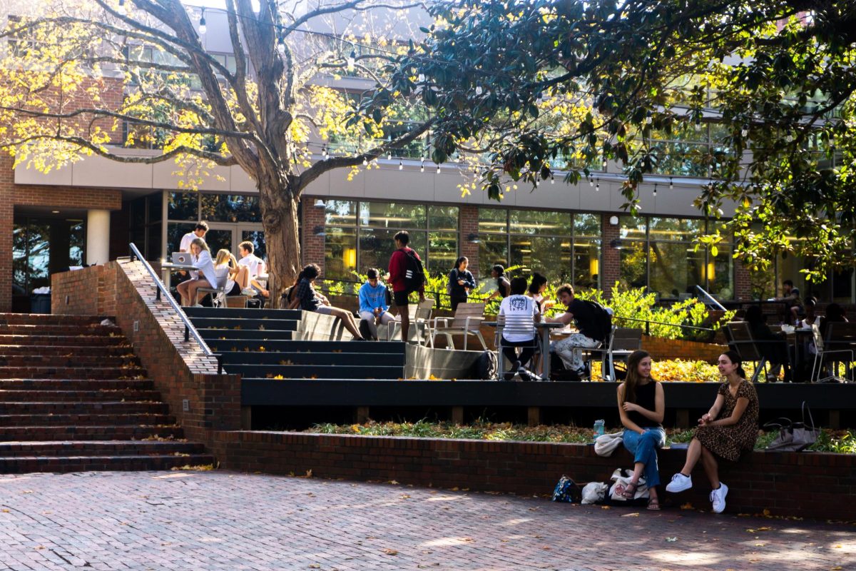 Students relax and eat lunch on the Rand patio, as captured on Nov. 4, 2023. (Hustler Multimedia/Laura Vaughan)