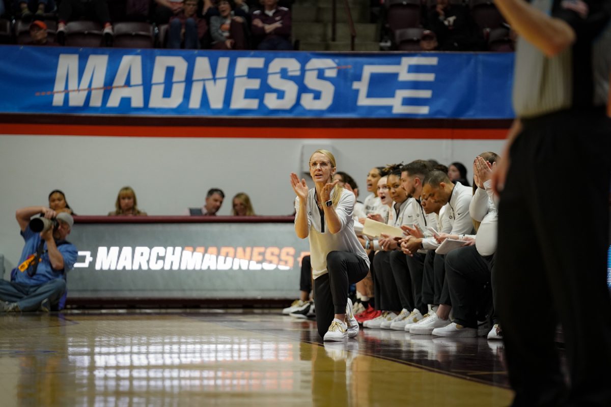 Coach Shea Ralph cheers from the sideline, as photographed on March 22, 2024. (Hustler Multimedia/Miguel Beristain)