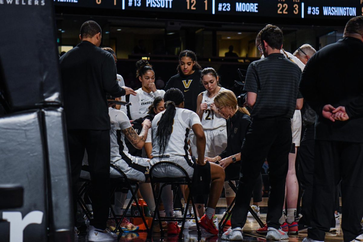 Coach Shea Ralph talks to the team during a timeout, as captured on March 3, 2024. (Hustler Multimedia/Savannah Walske)