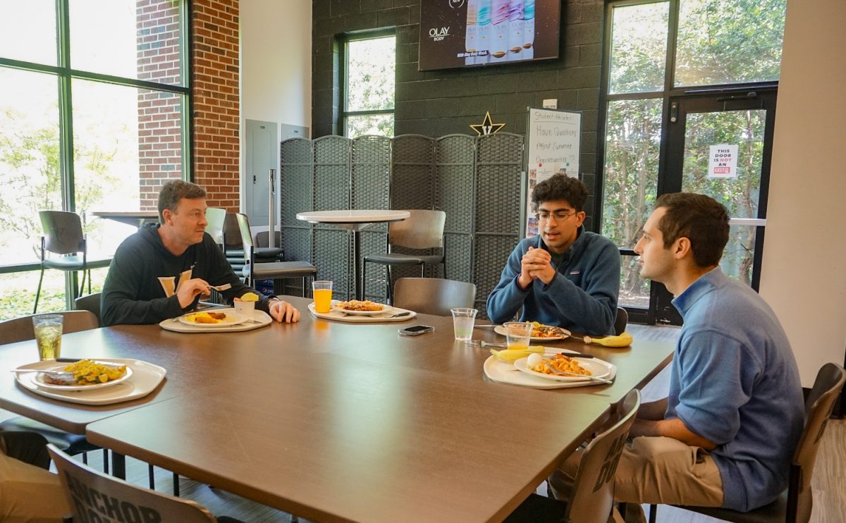 Mark Byington and members of the Hustler eating lunch on April 24, 2024. (Hustler Multimedia/Miguel Beristain) 