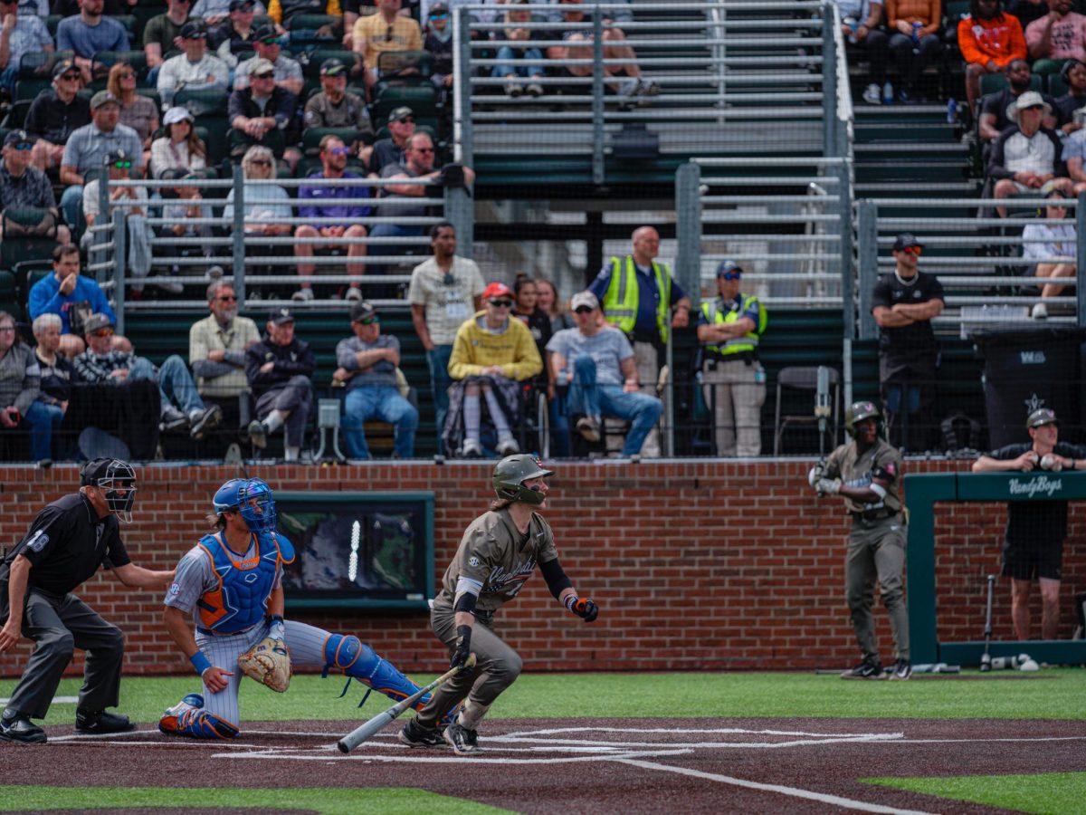 Vanderbilts Jonathan Vastine runs after hitting the ball. As photographed on April 20, 2024. (Hustler Multimedia/Ophelia Lu)