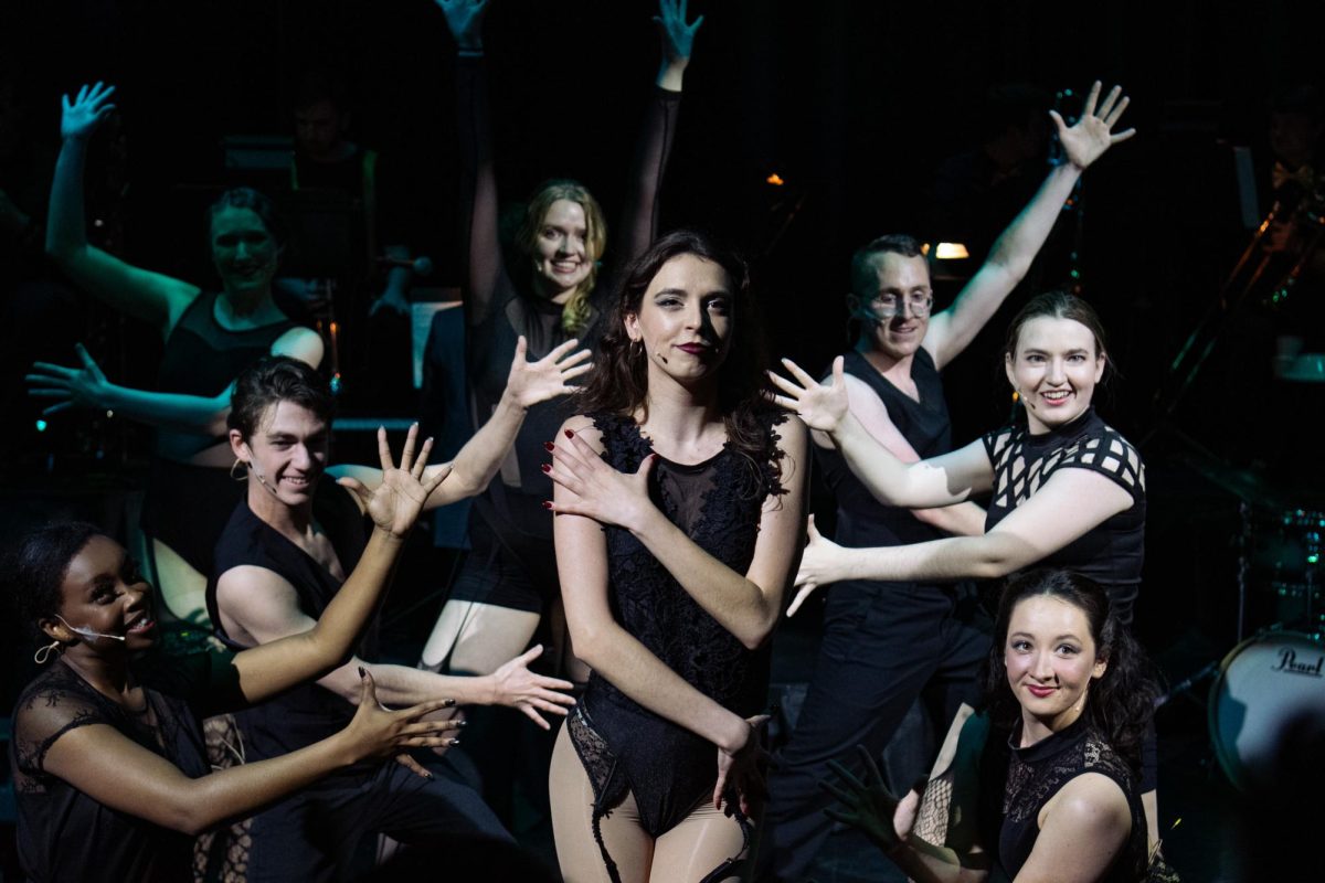 The actor for Velma Kelly, one of Chicago’s renowned murderesses, in a musical number surrounded by other actors, as photographed on April 17, 2024. (Hustler Staff/Savannah Walske)