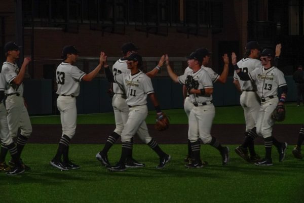 The VandyBoys high five after a win in their game against Missouri, as photographed on March 29, 2024. (Hustler Multimedia/Sofia Healy)