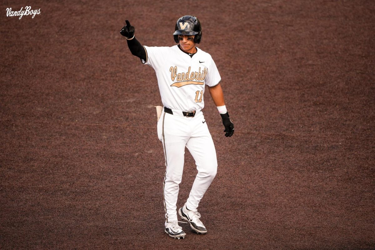 Davis Diaz signals to the dugout from second base. As photographed on May 11, 2024. (Vanderbilt Athletics)
