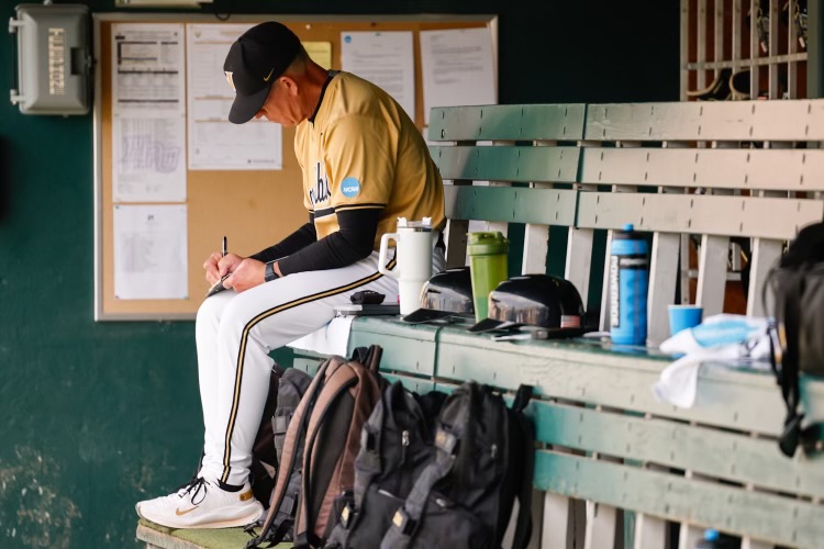Tim Corbin sits in the dugout, as photographed on June 1, 2024. (Hustler Multimedia/Barrie Barto)