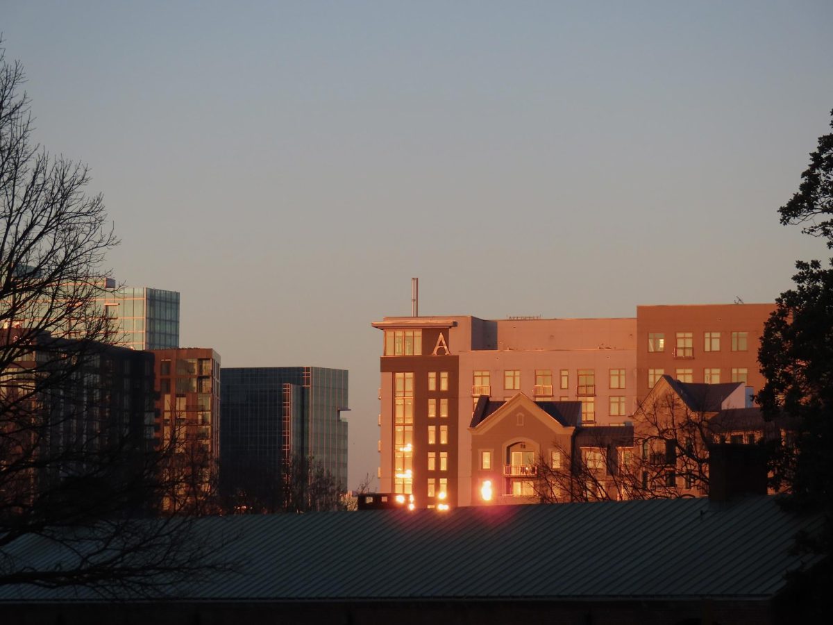 The sun reflects off apartment windows during golden hour, as photographed on Feb. 6, 2024. (Hustler Multimedia/Isabella Bautista)