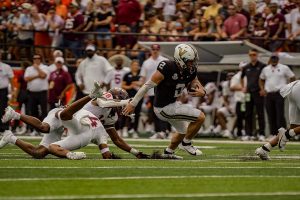 Diego Pavia scrambles during Vanderbilt's 34-27 win over Virginia Tech, as photographed on Aug. 31, 2024. (Hustler Multimedia/Miguel Beristain)