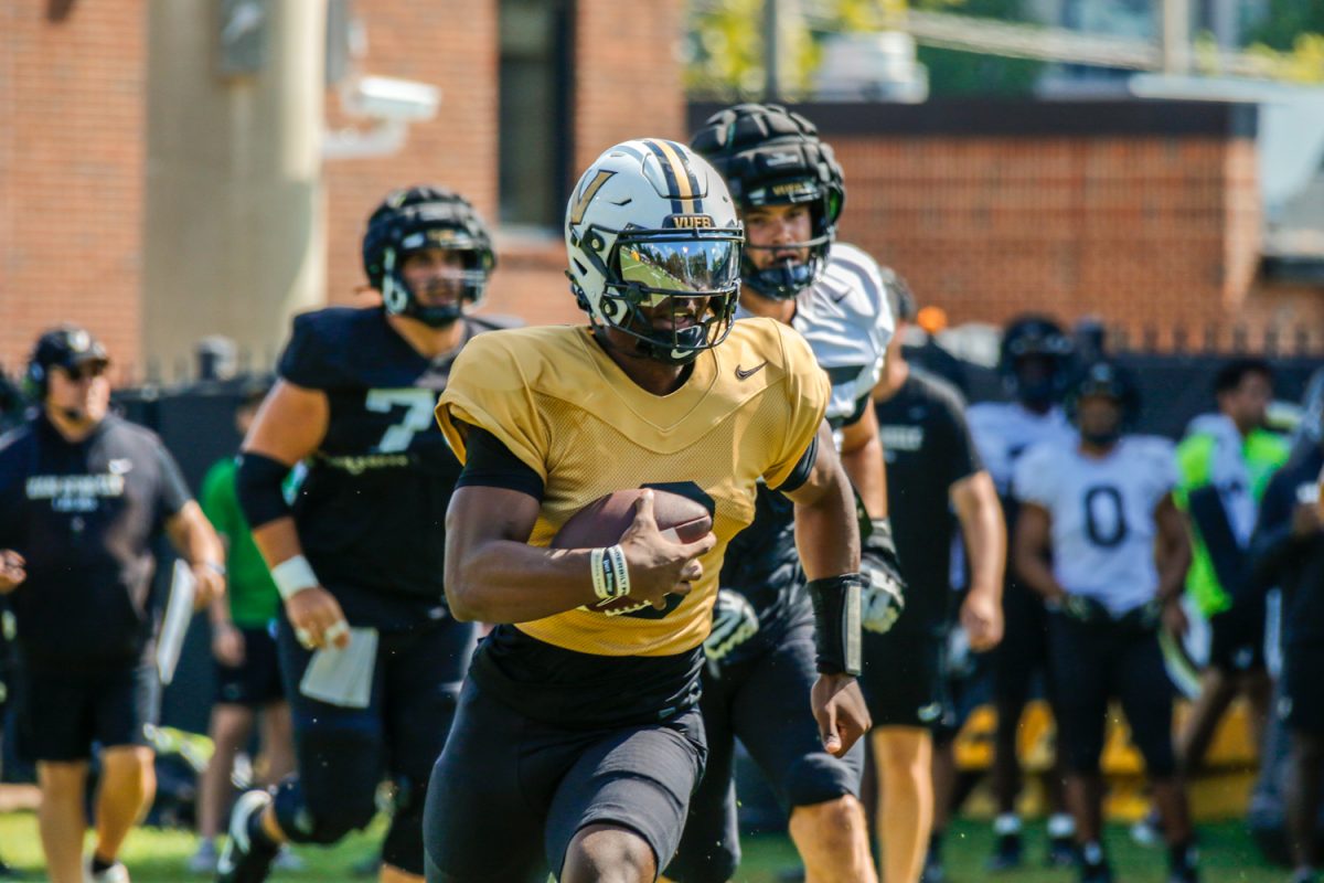 Vanderbilt's Nate Johnson carries the ball, as photographed on August 20, 2024. (Hustler Multimedia/Barrie Barto)