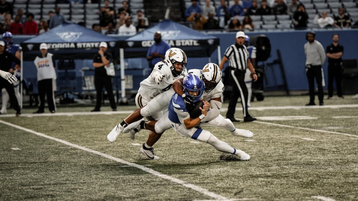 Bryan Longwell and Aeneas DiCosmo combine forces for a sack, as photographed on Sept. 14, 2024. (Vanderbilt Athletics)