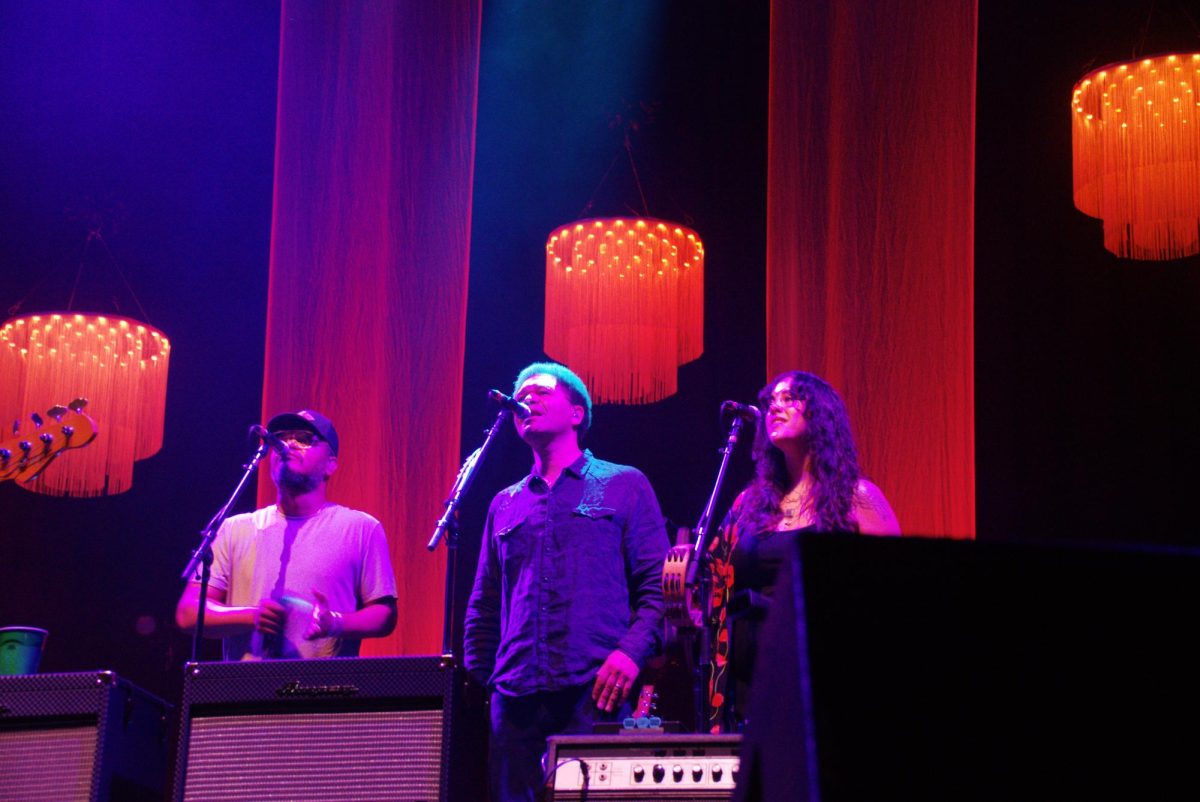 Mark Rivers, Mike Mattison and Alecia Chakour sing to the crowd together, as photographed on Sept. 21, 2024. (Hustler Multimedia/Amy Grill)