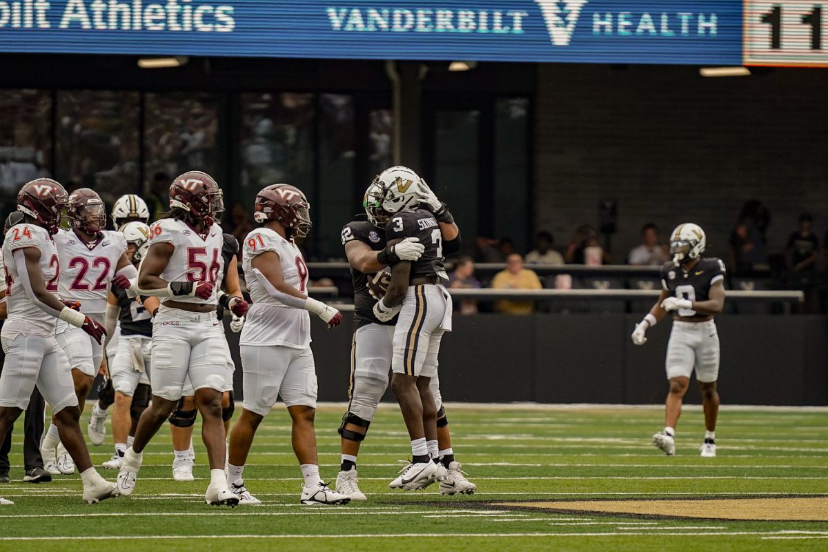 Quincy Skinner Jr. congratulated by teammates, as photographed on Aug. 31, 2024. (Hustler Multimedia/Miguel Beristain)