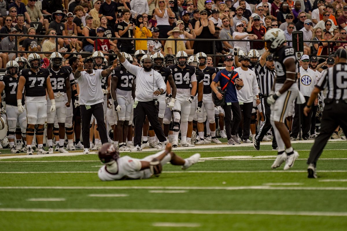 Vanderbilt's sideline celebrates after a huge sack of Virginia Tech quarterback Kyron Drones, as photographed on Aug. 31, 2024. (Hustler Multimedia/Miguel Beristain)