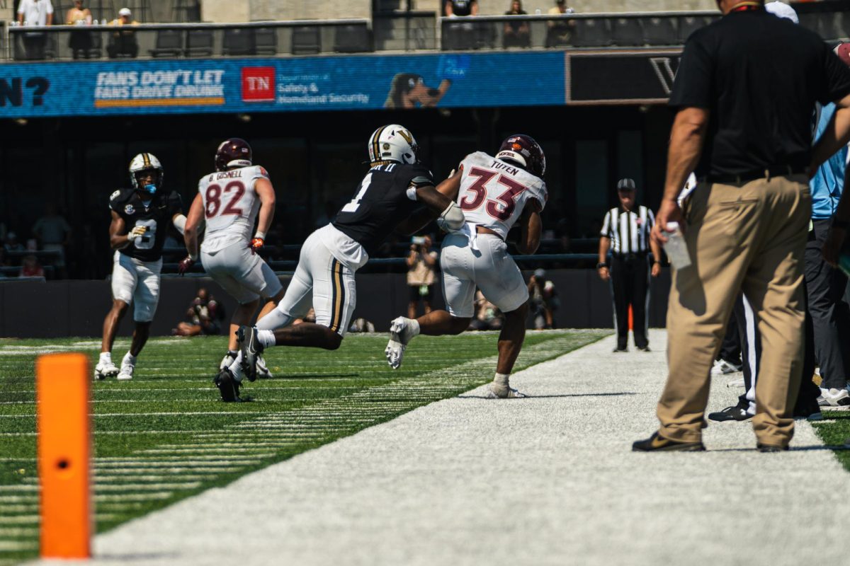 CJ Taylor tackles opponent off the field, as photographed on Aug 31, 2024. (Hustler Multimedia/Vince Lin)
