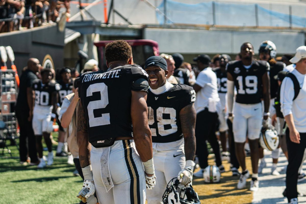 Sedrick Alexander and Randon Fontenette celebrate after Vanderbilt upsets Virginia Tech, as photographed on Aug. 31, 2024. (Hustler Multimedia/Vince Lin)